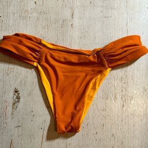 Manakai swimwear orange rouched bikini bottoms